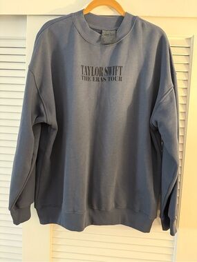 The coveted Taylor Swift The Eras Tour Blue Crewneck Sweatshirt! New w/o tag M